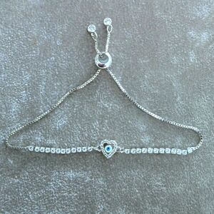 Silver Cubic Zirconia Bracelet with Blue Evil Eye Charm